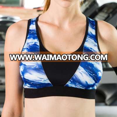 Woman running active wear bra & yoga bra made in Pakistan for gym wear